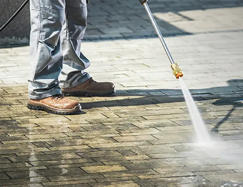 High-pressure washer for road cleaning